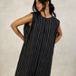 DRESS WITH PLEATED BACK LAYER DETAIL
