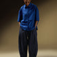 PANTS WITH FRONT AND HEM PLEATS