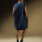 SLEEVELESS DRESS WITH ASYMMETRICAL FRONT PLEAT AND SHOULDER PADS