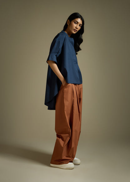 HIGH-LO TOP WITH FLARE AND PLEATED SLEEVE