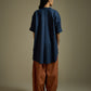 HIGH-LO TOP WITH FLARE AND PLEATED SLEEVE