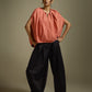 HIGH-LO TOP WITH FRONT AND BACK PLEATS