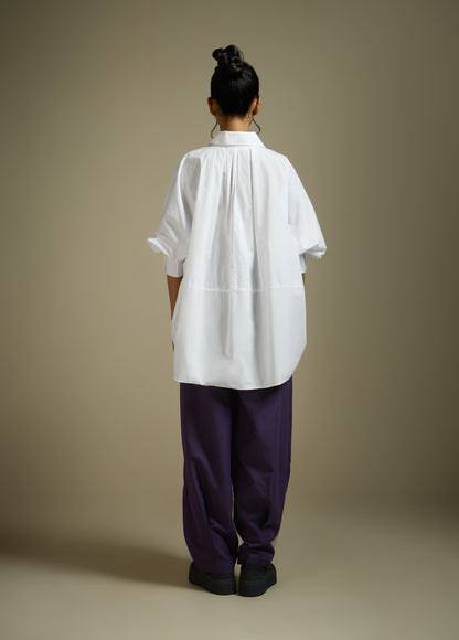 ANTI-FIT SHIRT WITH BACK PLEATS AND ROUNDED HEM