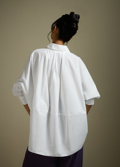 ANTI-FIT SHIRT WITH BACK PLEATS AND ROUNDED HEM