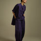 HIGH-LO TOP WITH FLARE AND PLEATED SLEEVE