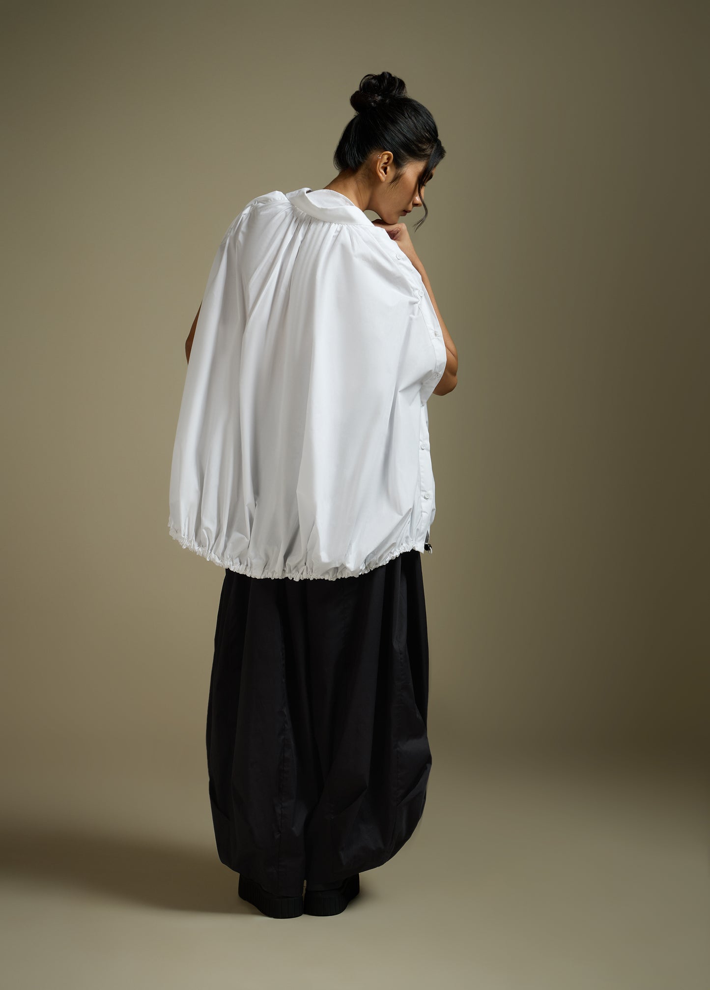 SHIRT WITH PLEATED BACK AND SIDE BUTTON DETAIL