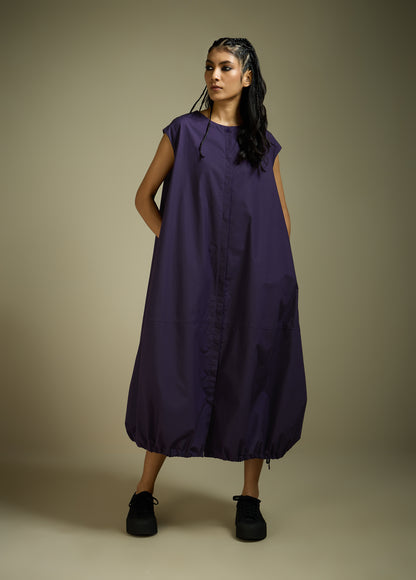 DRESS WITH HEM ROUCHE AND PANEL DETAIL