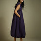 DRESS WITH HEM ROUCHE AND PANEL DETAIL