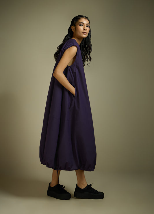 DRESS WITH HEM ROUCHE AND PANEL DETAIL