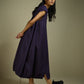 DRESS WITH HEM ROUCHE AND PANEL DETAIL