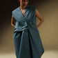 SLEEVELESS DRESS WITH ASYMMETRICAL FRONT PLEAT AND SHOULDER PADS