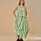 DRESS WITH DRAPE HEM AND STRAP DETAIL