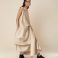 DRESS WITH DRAPE HEM AND STRAP DETAIL