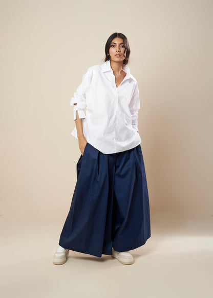 FLARED PANTS WITH SIDE PLEATS