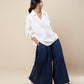 TOP V NECK WITH FRONT PLEAT PANEL AND ELASTIC BACK