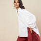 SHIRT WITH FLARE BACK AND CONSTRUCTED SLEEVE