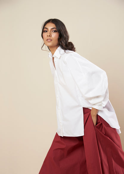 SHIRT WITH FLARE BACK AND CONSTRUCTED SLEEVE