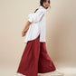 SHIRT WITH FLARE BACK AND CONSTRUCTED SLEEVE