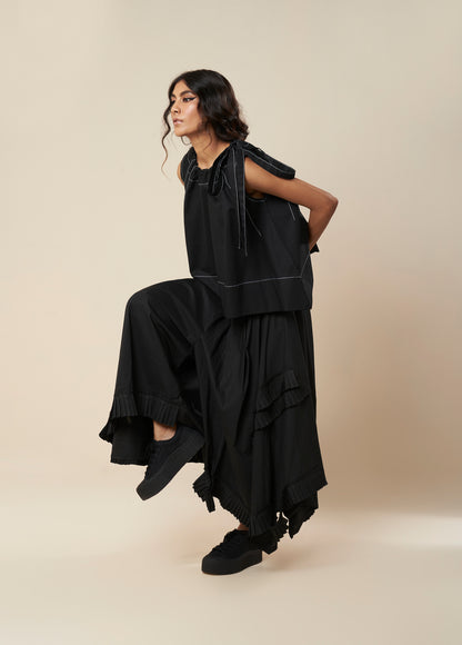 LOW CROTCH PANTS WITH ASYMMETRICAL FRILL PANELS