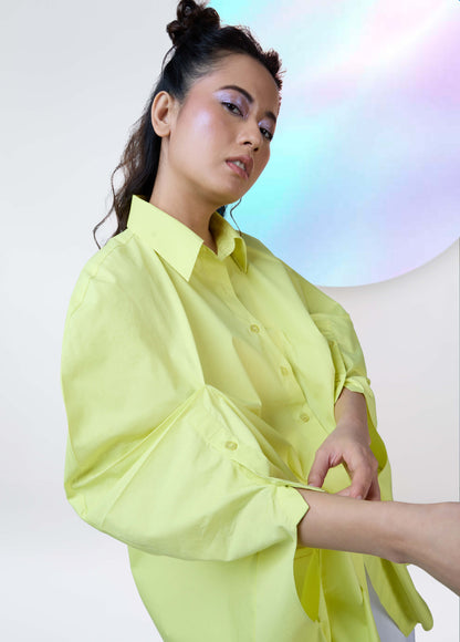 SHIRT WITH EXAGGERATED PLEATED SHOULDER AND CUT SLEEVE