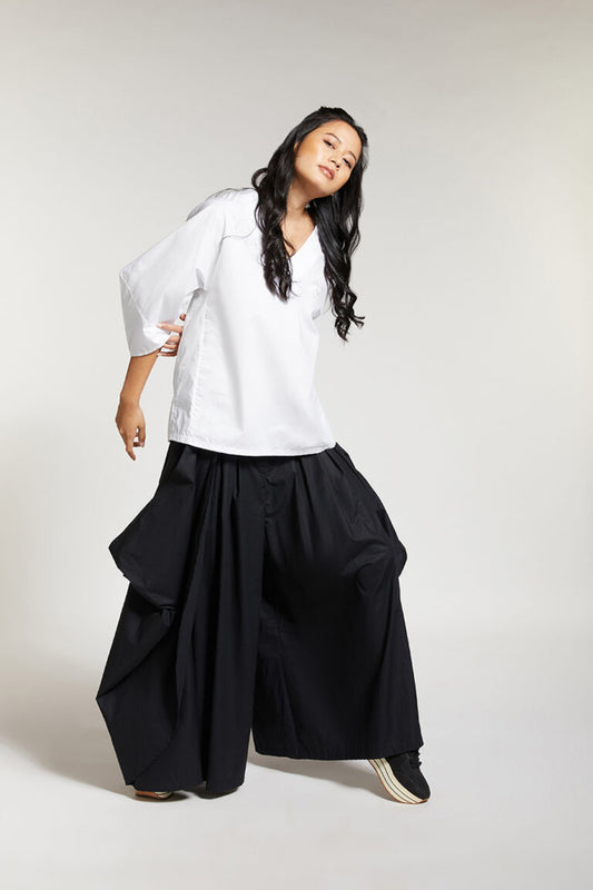 FLARED PANTS WITH SIDE PANEL